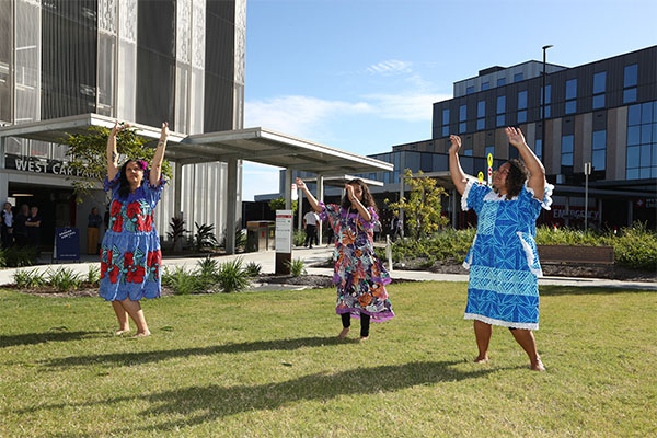 South Sea Islander community members dance at the official opening